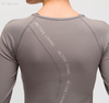 FC Sports New Sanding Nude Yoga Clothing Professional Elastic Quick-drying Fitness Shirt Chest Pad Letter Long-sleeved T-shirt Female